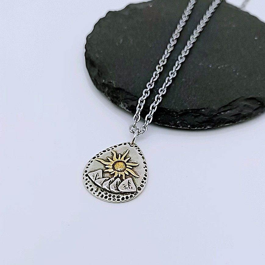 Rising sun pendant necklace product presentation