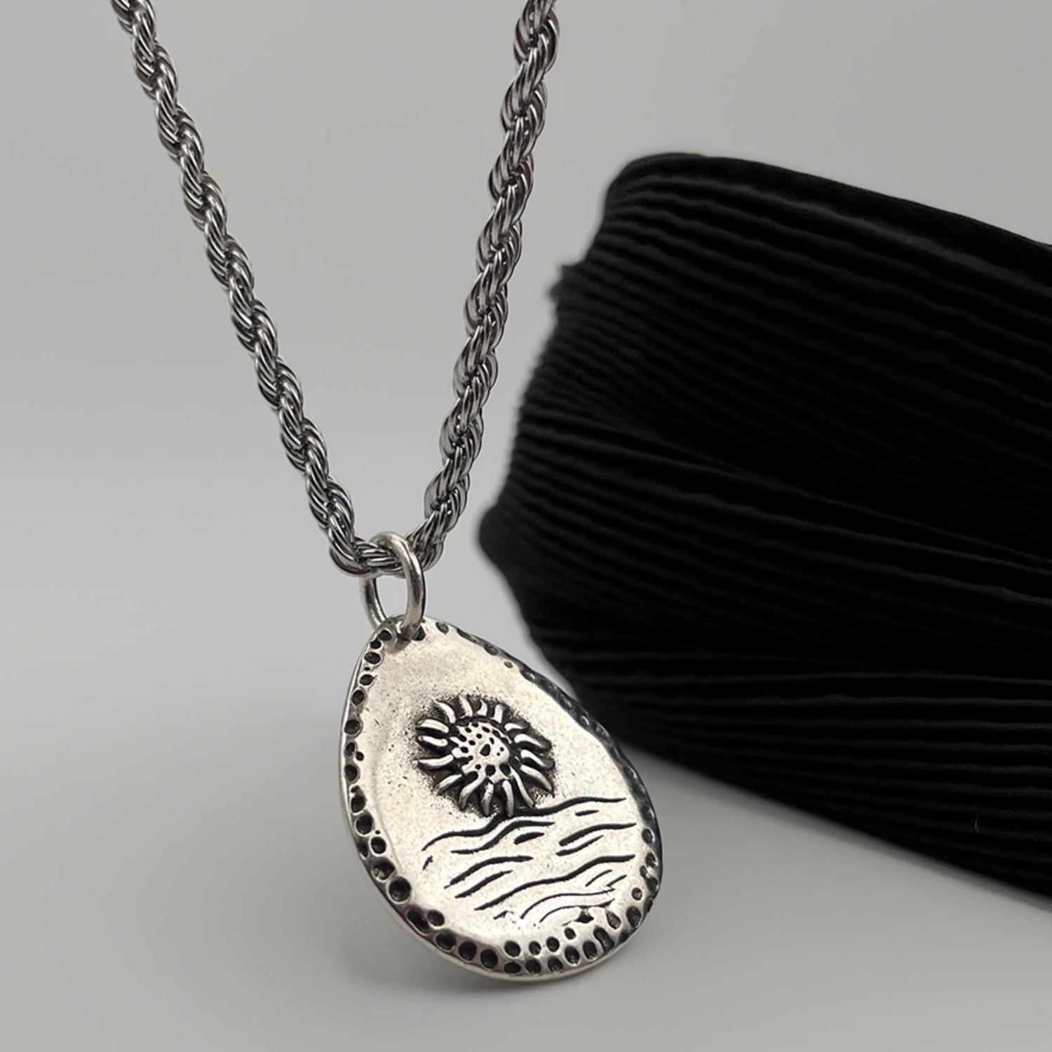 Rising sun pendant necklace chain detail