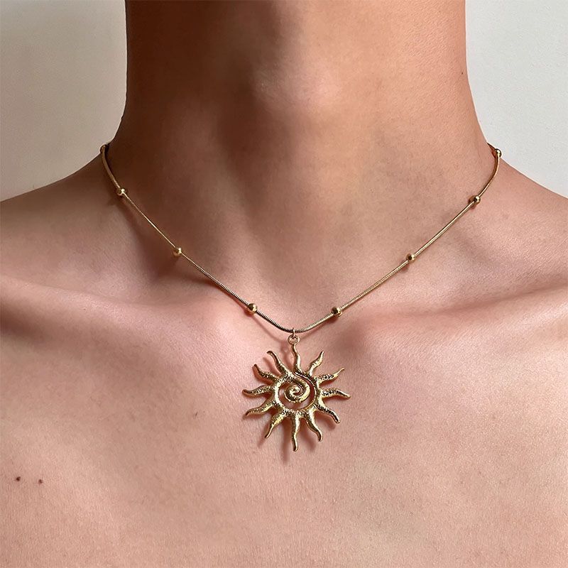 Gold tone Apollo sun pendant necklace main product view
