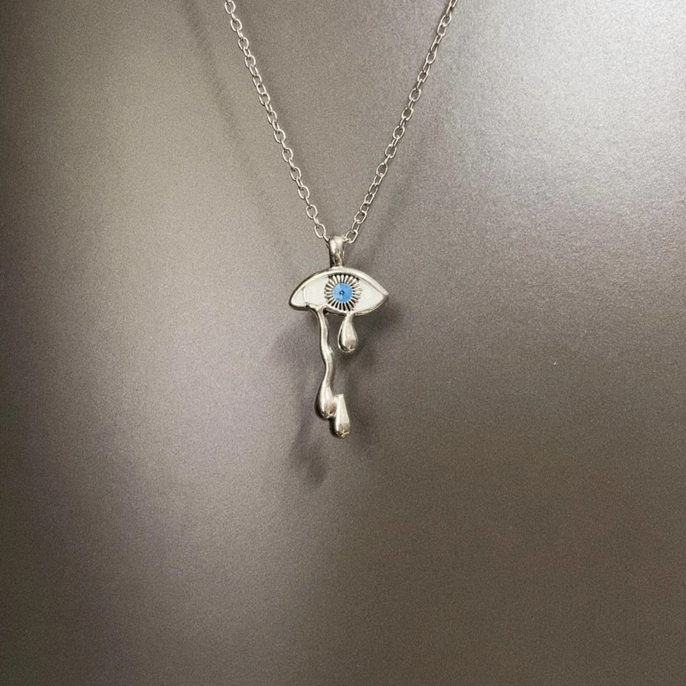 White tear eye necklace pendant detail