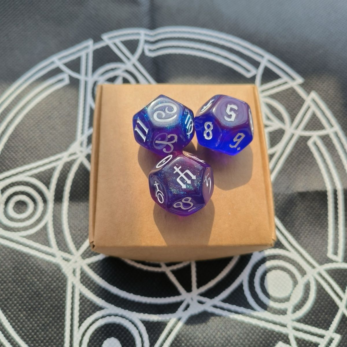 Astrology dice set with celestial symbols