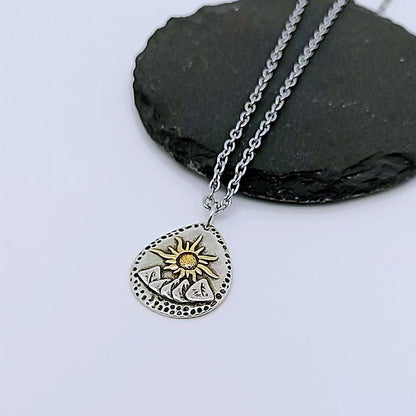 Rising sun pendant necklace product presentation