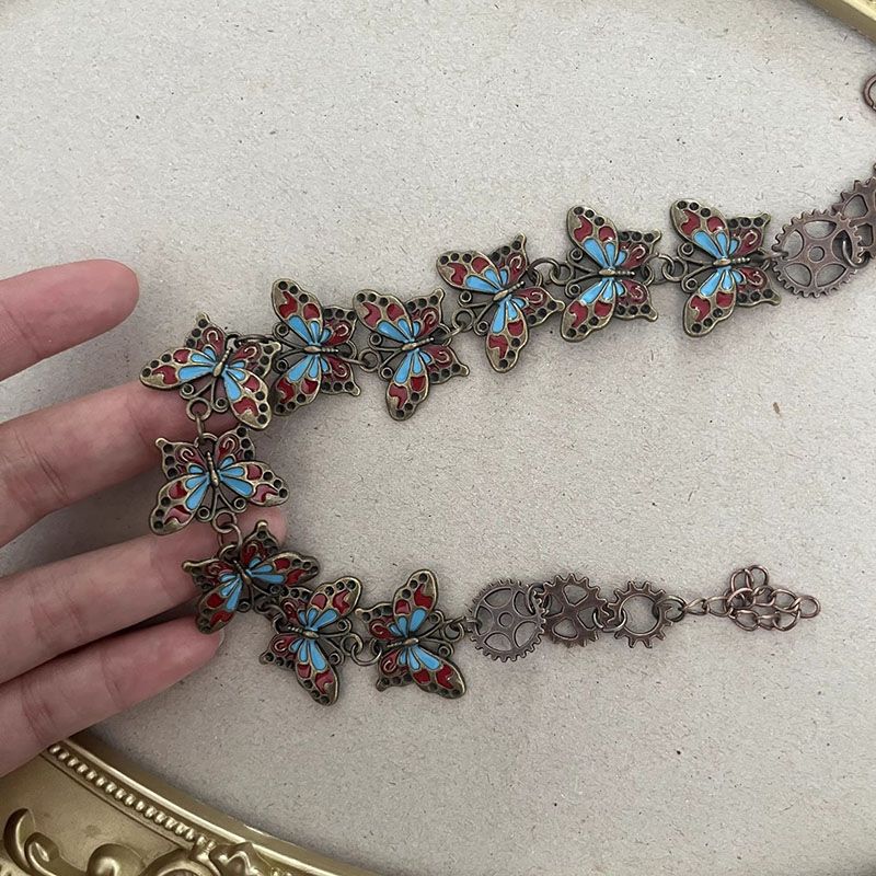 Mechanical butterfly bracelet gear-inspired detail