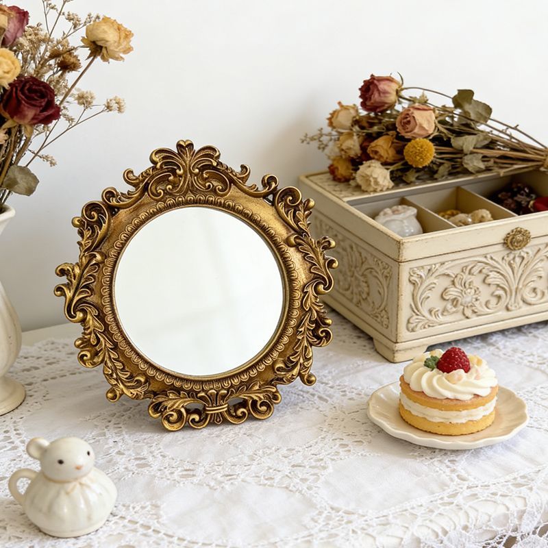 Embossed round mirror frame detail